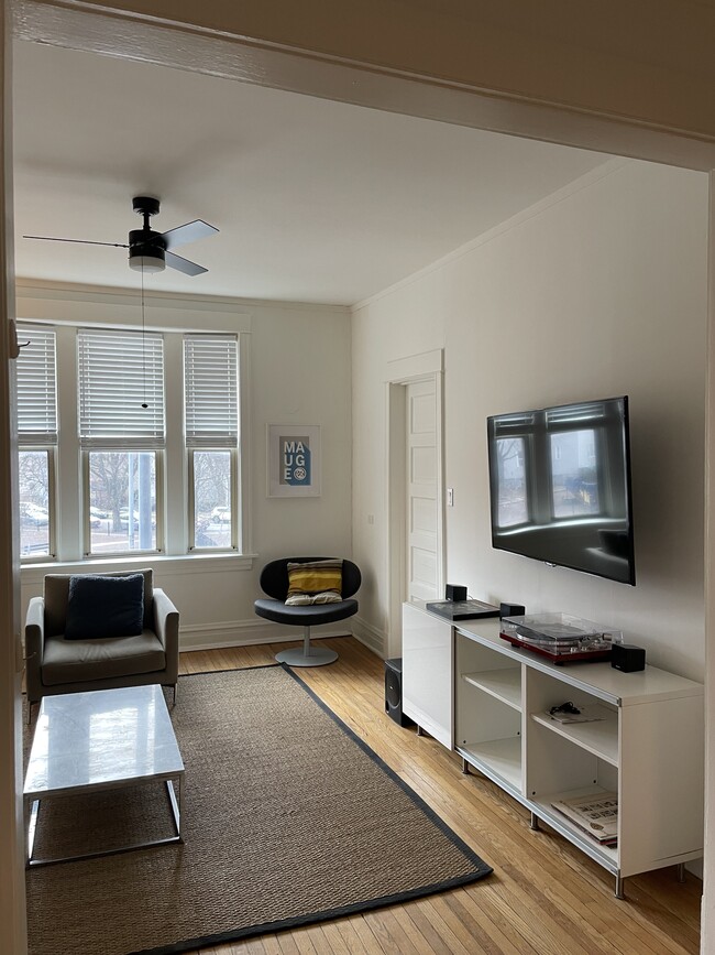 Apartment comes with a tv, stereo, and console cabinet. - 3489 N Elston Ave Unit 2