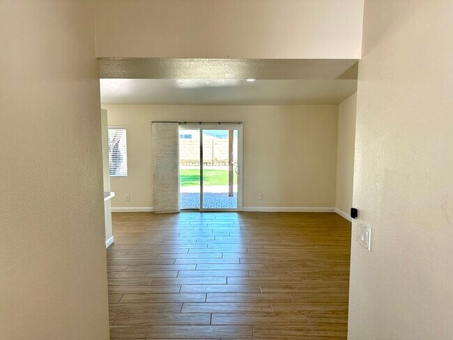 Photo - Beautifully updated Mesa home near Whitman Park with wood-look tile, fresh paint, vaulted ceiling...