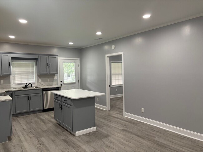 Photo - Fully renovated 3 bedroom 2 bathroom house! Lawn Care Included