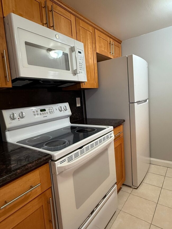 Photo - Spacious 2 Bedroom 1 Bath Condo with private patio and storage Unidad M
