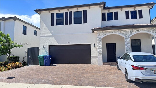 Building Photo - 12983 SW 229th Ter Unit REAR