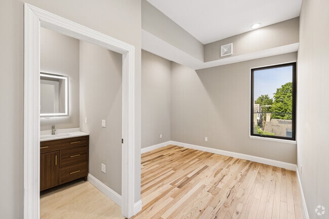 2BR, 2BA - 1,208SF - Primary Bedroom