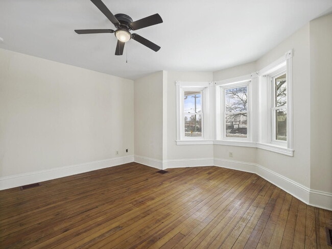 Photo - Charming 3-Bedroom Single-Family Home with Wrap-Around Porch & Private Fenced Yard