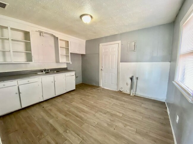 Photo - $100 off rent per month for 12 months + 50% deposit now and 50% later