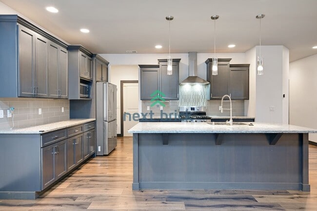 Photo - Stunning 3 Beds and 3 Bath Single Family with additional office space and entertainment room read...