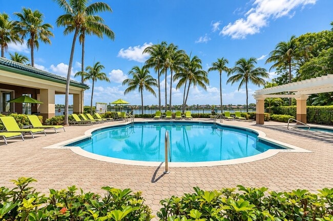 Unwind in the tranquil oasis at Club Lake Pointe. Surround yourself with palm trees and relax by the inviting poolside, perfect for sun-soaked days. Schedule a visit today to make this serene lifestyle your own!