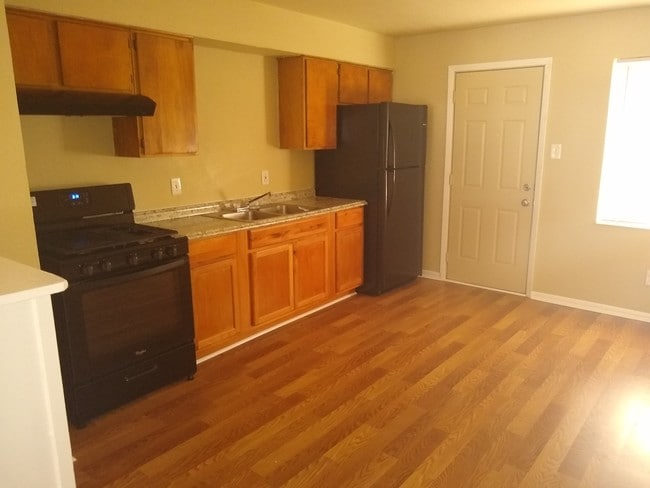 Kitchen comes w fridge and stove - 7742 Mclean St Unit B