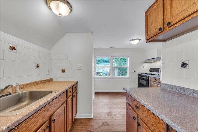 Building Photo - 3571 W 69th St Unit 2/UP