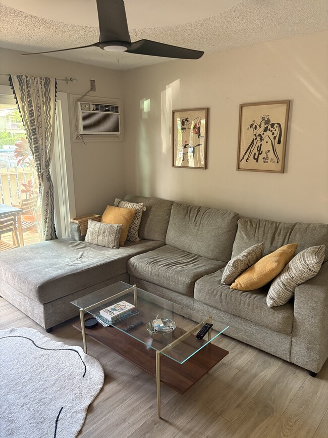 Comfortable sectional couch and A/C unit - 140 Uwapo Rd Unit 53-101