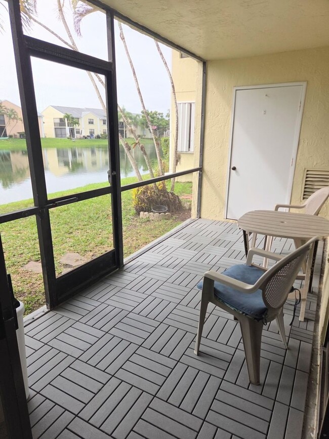 Building Photo - Fully furnished Lake View Condo in Gated Community