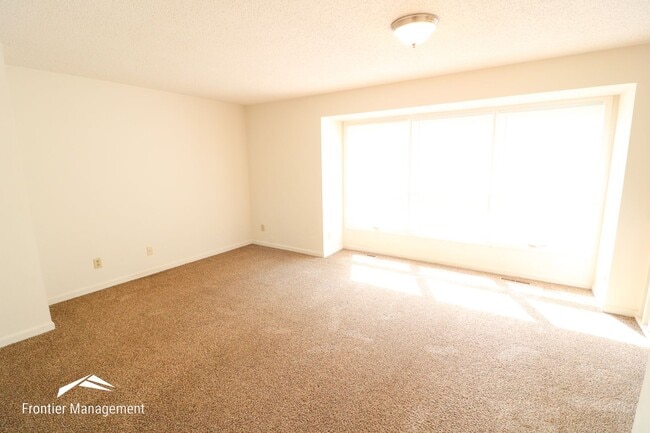 Photo - Spacious 3 bedroom townhome with a fenced in backyard!