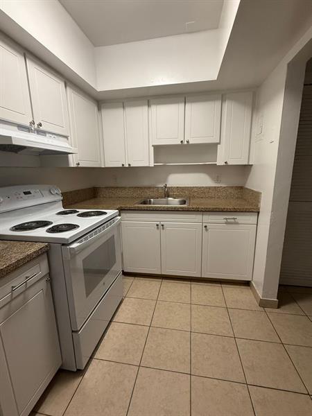 Building Photo - 890 NW 39th St Unit 12 Rental