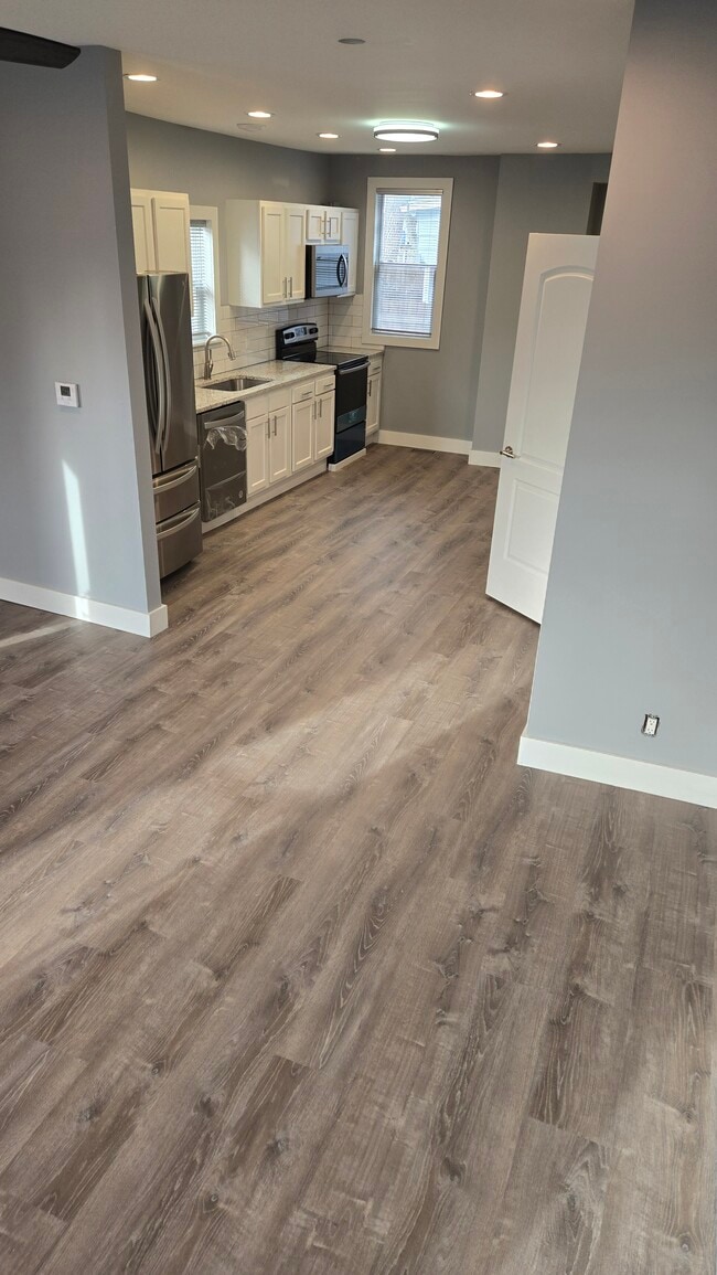 Living Room to Kitchen - 594 E Sycamore St