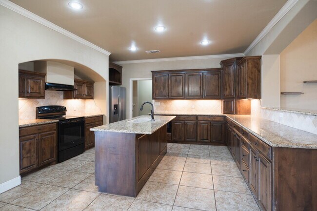 Photo - Beautiful 4-Bedroom Home with High Ceilings Available for Summer 2026 Pre-Lease