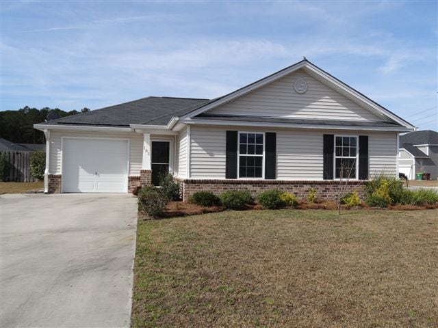 Building Photo - 4 Bedrooms, 2.5 Bathrooms in Live Oak Subdivision