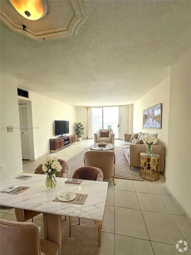 Building Photo - 4675 W 18th Ct Unit 801 Rental