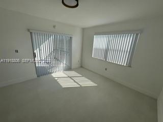 Building Photo - 8590 SW 212th St Unit 106