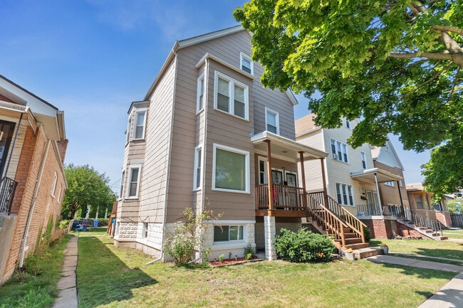 Building Photo - 9330 S Yates Blvd Unit 3