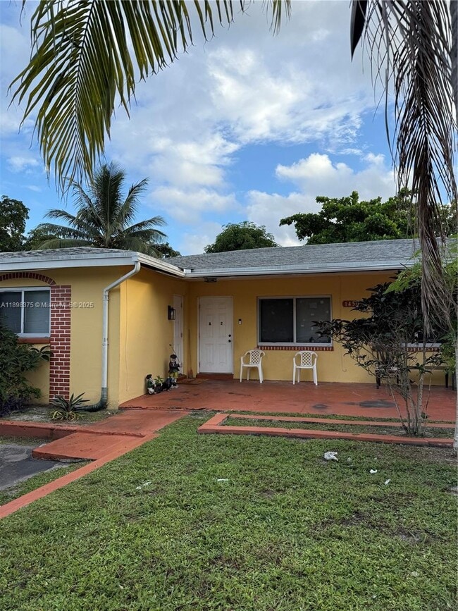 Building Photo - 1450 NW 20th Ct Unit 1-2
