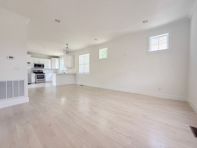 Photo - Pet-Friendly 3-Bedroom Home with Modern Features, Covered Deck & Bright Open Space