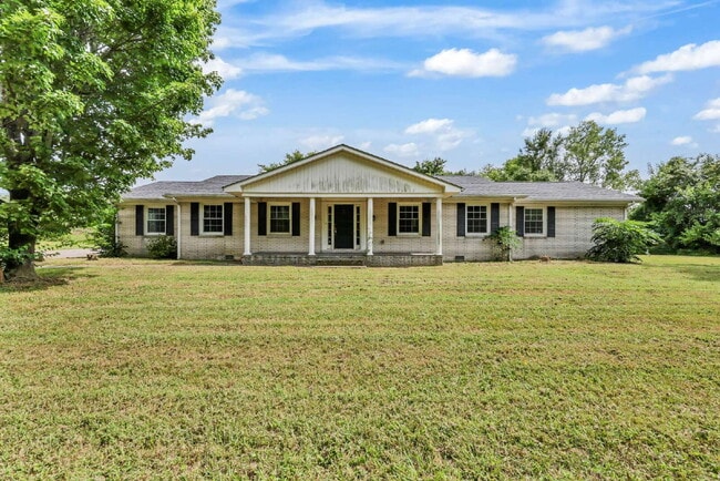 Photo - spacious 4-bedroom, 2.5-bath home featuring a 2-car garage and fresh updates throughout.