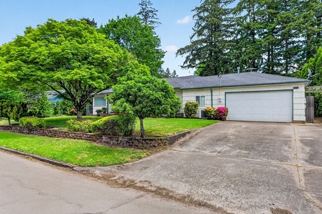 Photo - Charming Ranch Home with Hardwood Floors, Fireplace & Lush Curb Appeal