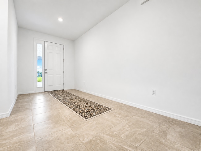 Photo - Experience modern & expansive living in this corner-lot 5Bedrooms/3.5Bath home at Ocala!