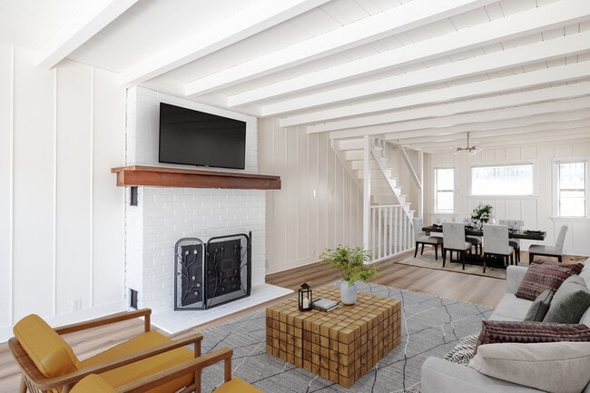 Living Room/Dining Room with Fireplace - 1150 Manhattan Ave