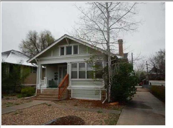 Front of 4 unit house, parking in rear - 915 13th St Apartments Unit D