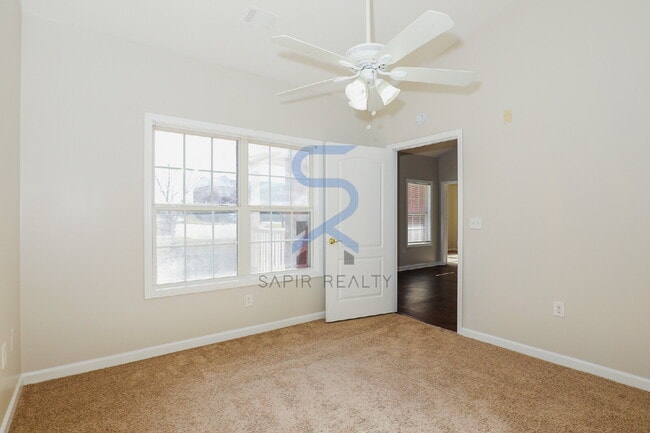 Photo - Move in before January 31st and choose your reward: a $250 Amazon Gift Card or a 55" Smart TV! Unit 524