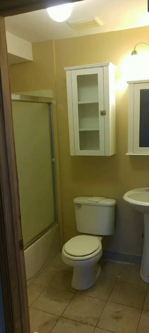 Photo - Cozy 2-Bedroom Home with Basement & Off-St...