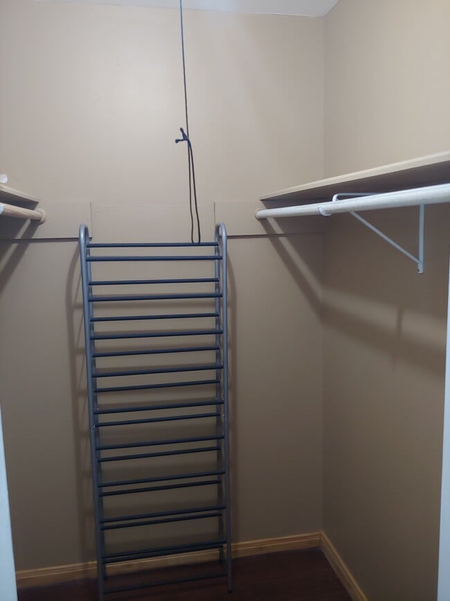 Spacious walk in closet with plenty of room for clothes and shoes. - 250 Highland Terrace Dr