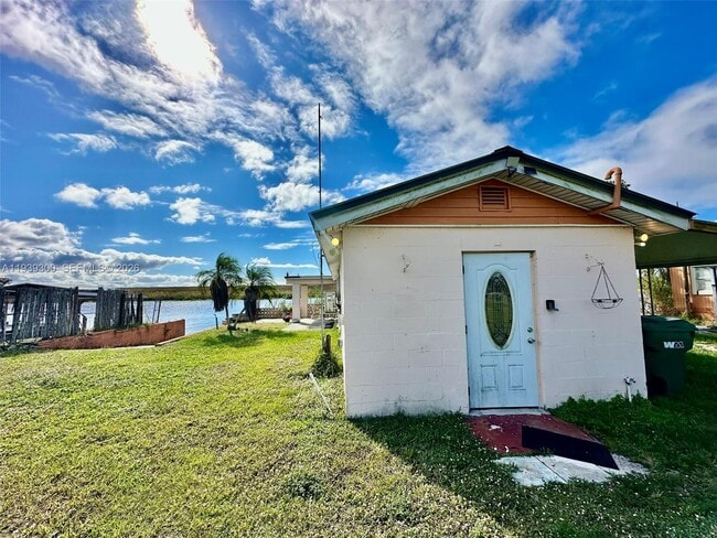 Building Photo - 6268 US-441 Unit back