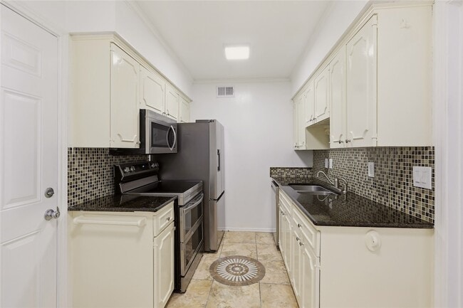 Building Photo - 7937 Royal Ln Unit 124K