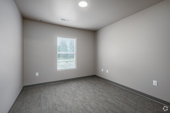 2BR, 2BA - 1100SF - First Bedroom - Deadwood Ridge Apartments