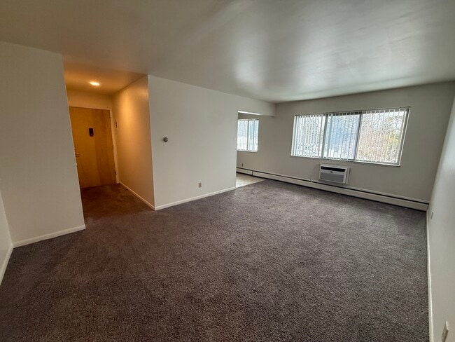 Living Room View from Hallway - MadGrey Apartments