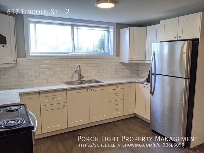 Photo - Bright and Sunny 2 Bedroom Basement with Yard, Parking and Tons of Storage Unit 2