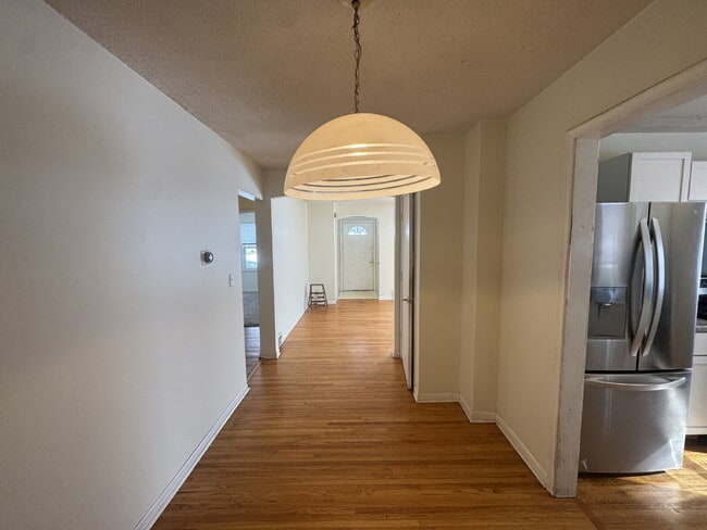 Photo - "Charming 3-Bed Haven with Hardwood Floors & Cozy Fireplace in St. Louis Park!"