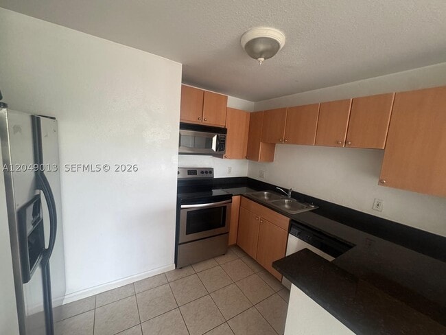 Building Photo - 1780 Palm Cove Blvd Unit 6-306