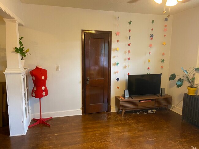 Living room with coat closet