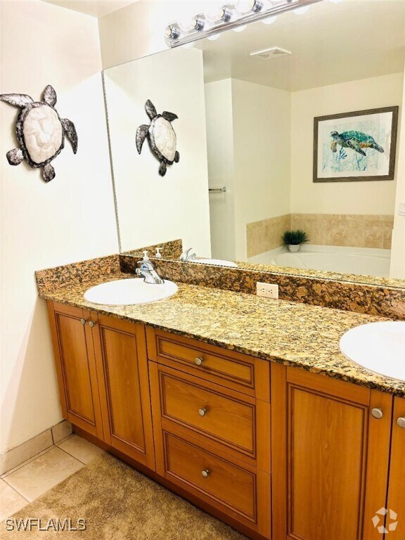 Building Photo - 10101 Villagio Palms Way Unit 207 Rental