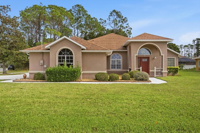 Photo - "Charming 3-Bedroom Home with 2 Full Baths and 2032 Sq Ft of Comfort in Palm Coast!"