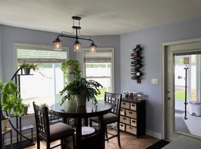 Photo - Stylish 3BR Home with Open Layout, Screened Porch & Fenced Yard