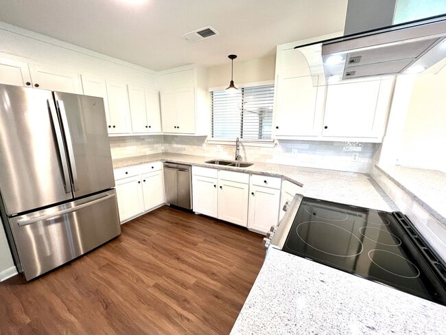 Photo - Updated 3 Bedroom Home with All Appliances & Double Garage