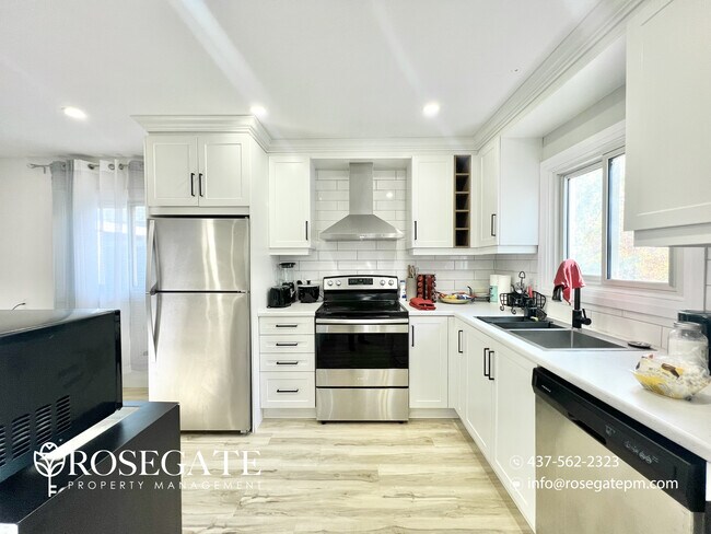 Photo - Charming 3-Bedroom Detached Home with Balc... Unit 1