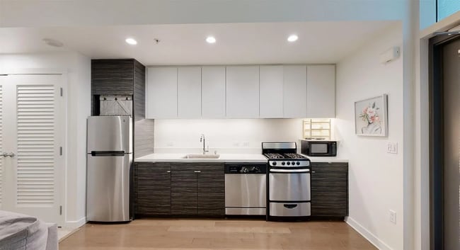 Building Photo - Corner view. Luxury. High end appliances. ... Unit E304 Rental