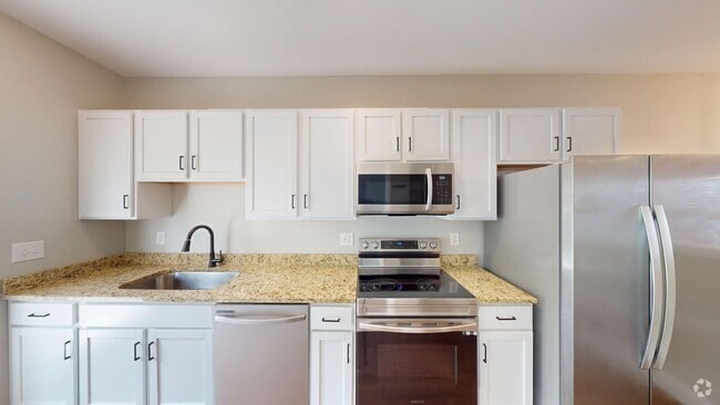 Building Photo - Two Bedroom Townhomes With Flex Room at Th...