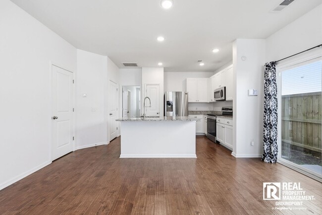 Photo - 3BR | 3.5BA | 3-Story Townhome | Bonus Loft | Fenced Yard