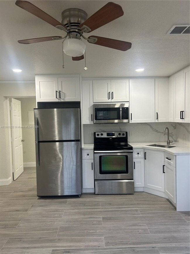 Building Photo - 1360 NW 132nd St Unit 0