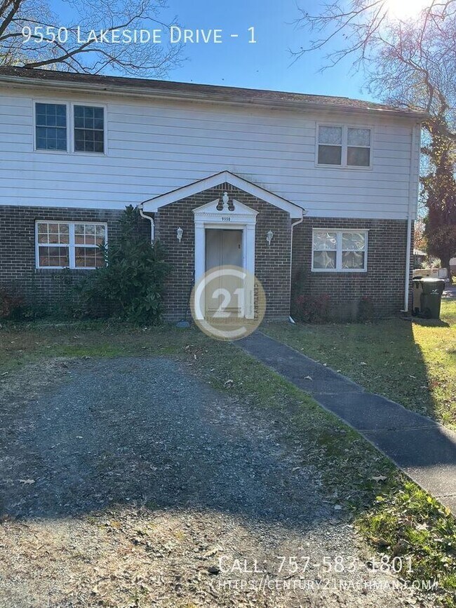 Building Photo - 9550 Lakeside Dr Unit 1